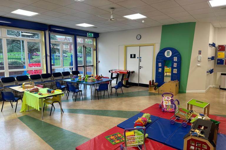 A playroom in a school with lots of colourful sensory toys 